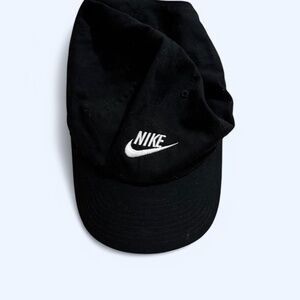 Black Nike cap with white swoosh
